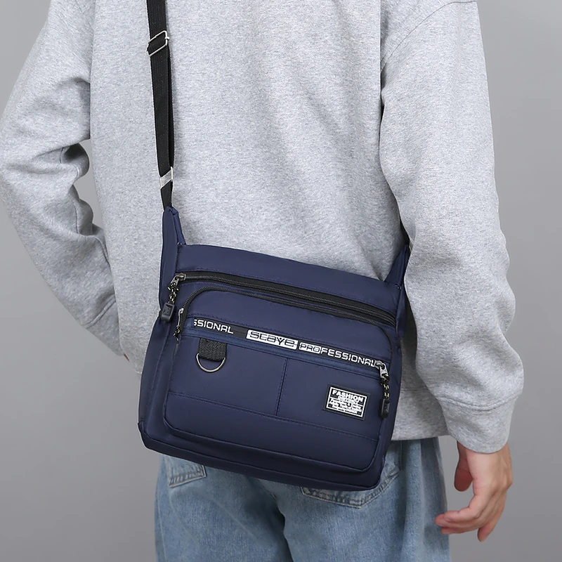 น้ําหนักเบา Casual Oxford ไหล่กระเป๋าสําหรับชายแบบพกพาขนาดใหญ่ความจุกระเป๋า Crossbody หลายกระเป๋ากระเป๋าเดินทางทุกวันชาย