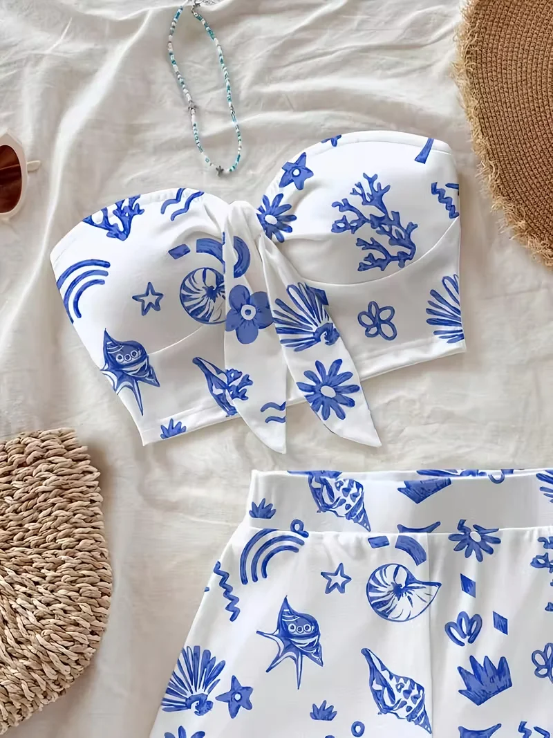 Damski letni zestaw dwuczęściowy: top z efektem skręcenia z przodu i szorty, idealny na wakacje na plaży.