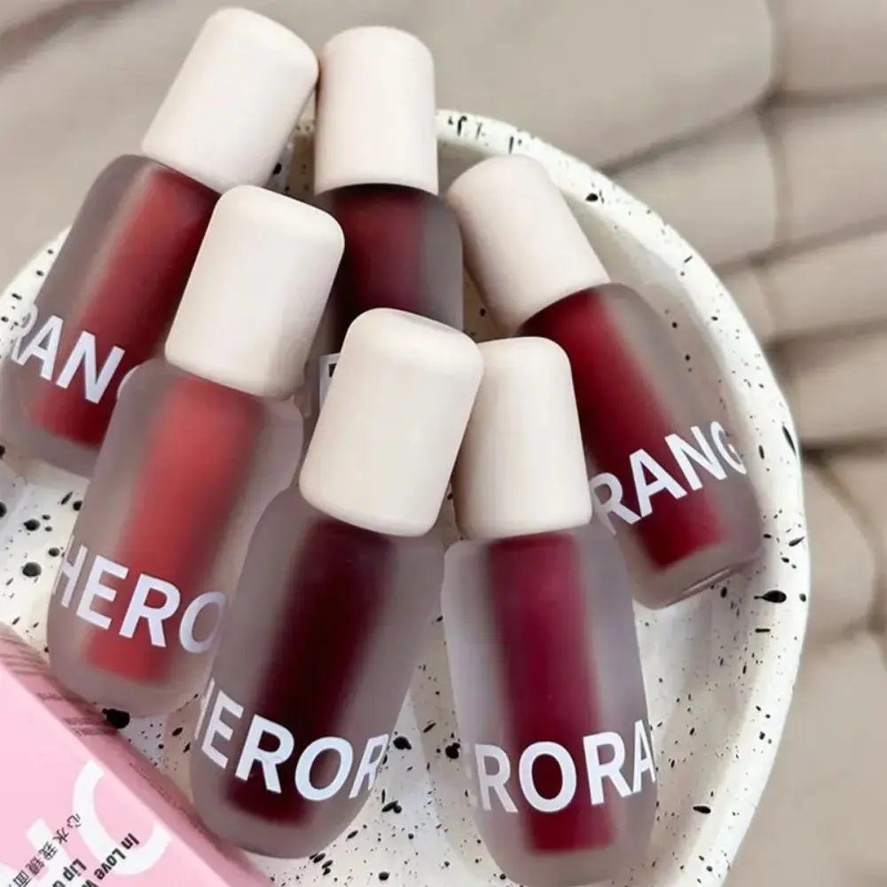 Nuovo smalto per labbra a specchio lucido Tinta per labbra schiarente per la pelle a lunga durata Lucidalabbra per acqua Adatto ai studenti