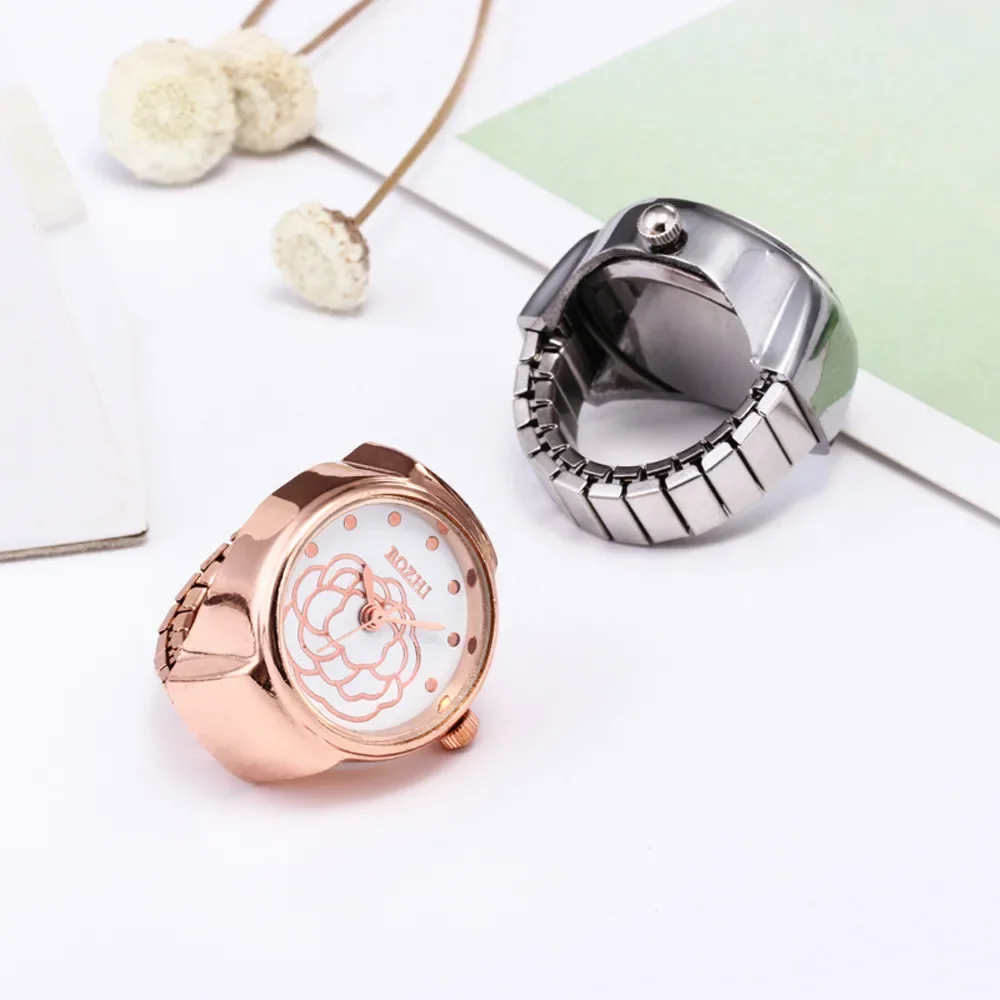 Reloj analógico de cuarzo con esfera de oro rosa para hombre y mujer, cronógrafo de pulsera de acero creativo, anillo de dedo elástico fresco, Unisex, regalo