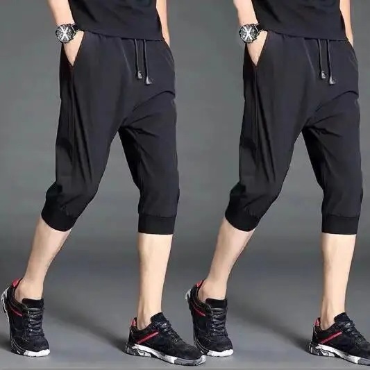 กางเกงขายาวทรงหลวมผ้าไหมน้ำแข็งสำหรับผู้ชาย ฤดูร้อน เนื้อผ้าบางเบา สปอร์ต ขาเจ็ดส่วน เอวสูง ผสมโพลีเอสเตอร์ ใส่สบาย ระบายอากาศได้ดี