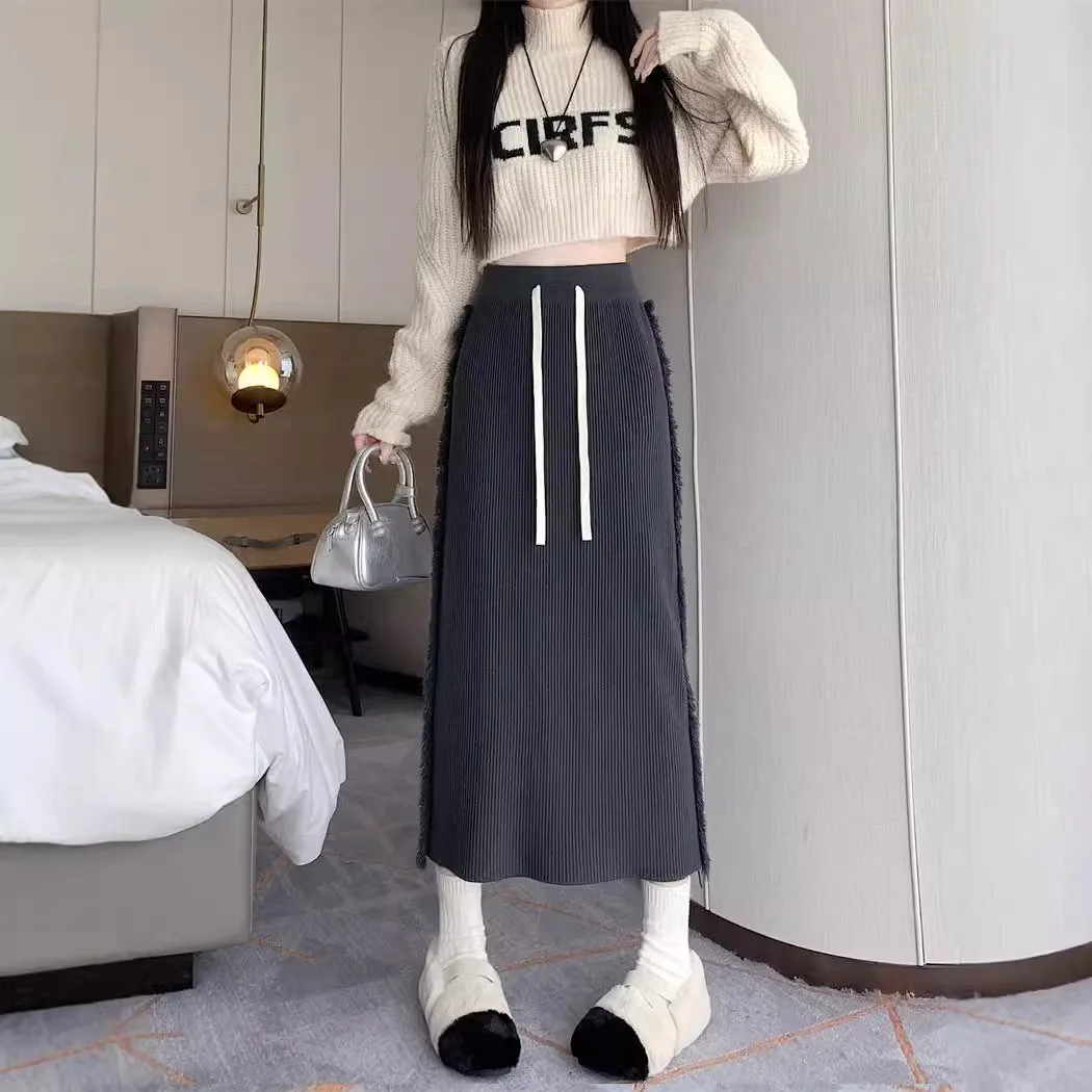 

Корейская вязаная юбка-свитер средней длины с бахромой, А-силуэт, женская, осенне-зимняя, теплая, облегающая, длинная юбка-накидка, в стиле «ленивый шик», фасон «летучая мышь»