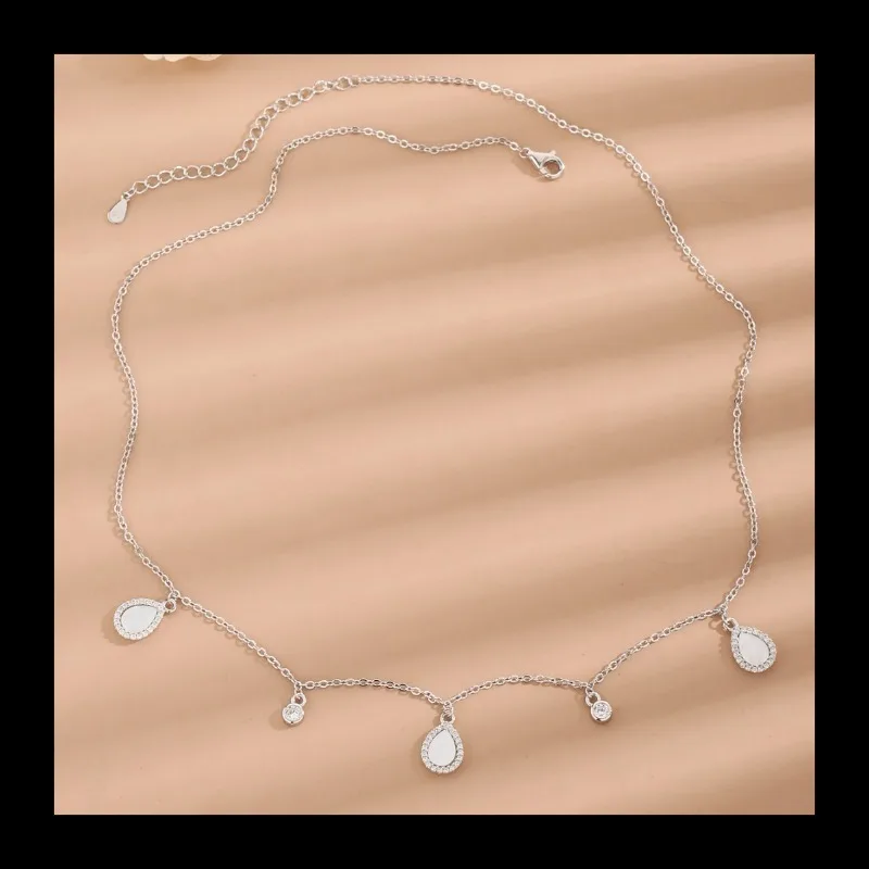 AliExpress جديد شخصية S925 قلادة فضية بسيطة قطرة الماء قلادة المرأة الماس تصميم الأزياء المتخصصة الشعور