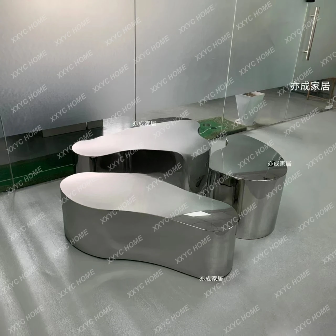 Nordic light luxury stainless steel simple Nakajima water table creative special-shaped display table living room coffee table image 2