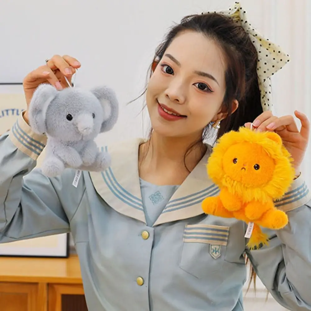 快適なおもちゃ 白いウサギ 小熊 小ライオン 子羊 象の人形 漫画 かわいい動物 猿の人形 フェスティバル パーティーの装飾