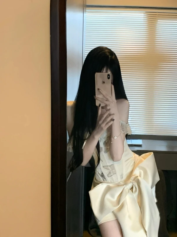 

Комплект из двух предметов: кружевной топ-бюстье и юбка с узлом Sweet Pure Desire, модный ансамбль от Qianjin Heavy Industry