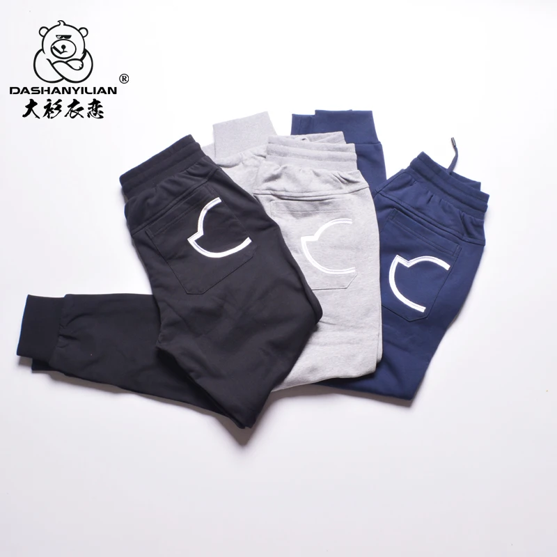 

Модные мужские повседневные брюки свободного покроя с эластичной резинкой на талии из смеси хлопка и полиэстера, утягивающие леггинсы с вышивкой и манжетами