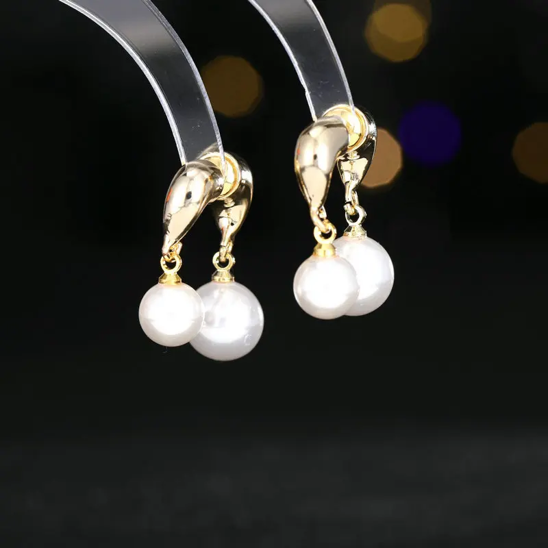 

New fashionable and irregular style earrings with a niche design, popular s925 silver needle front and back pearl earrings