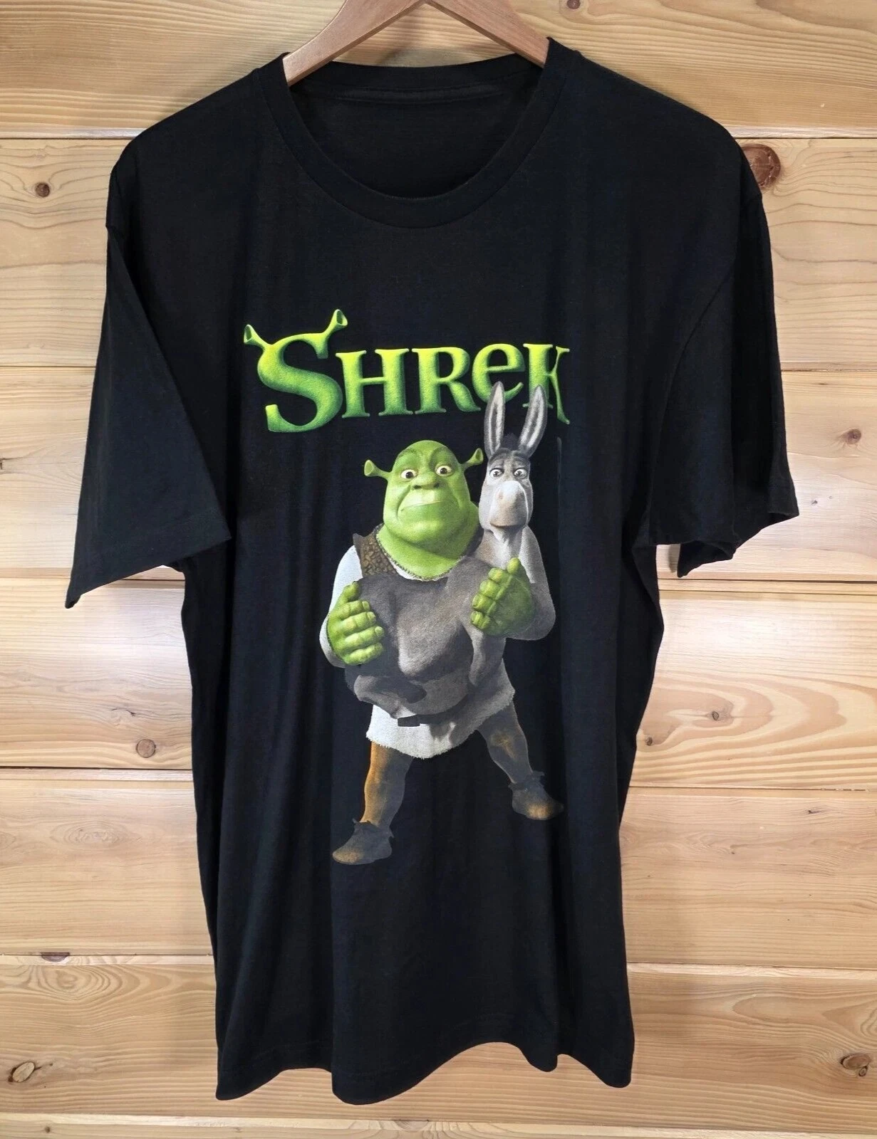 2025 ديزني شريك فيلم الترويجي تي شيرت الرجال حجم NWOT حمار Dreamworks للجنسين القطن قصير الأكمام شارع العليا