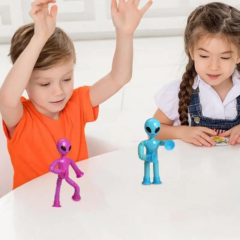 2023 Novel Kids Suction Cup Toys Telescopic Suction Cup Alien Toy Cartoon Telescopic Pipe Planet Man Stretch Decompress Toys