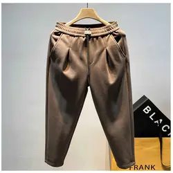 American Retro Frühling Herbst Herren neue gespleißte elastische Tasche Mode einfarbig lose minimalist ische lässige Harems hose