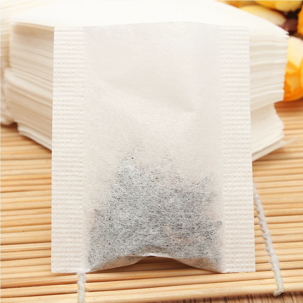 

Hot Pro Top Empty Teabags Set White Brewing Resistant Non-Woven Fabric Bags Herb Loose Tea 5.5x6.2cm 500Pcs Pepper