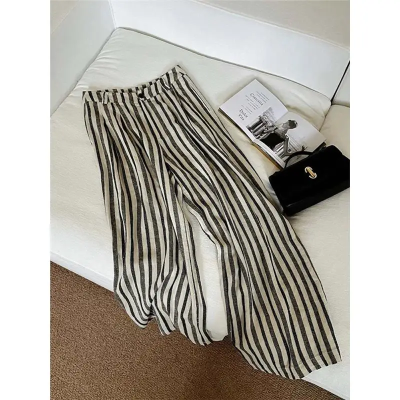 กางเกงขายาวเอวสูงทรงหลวมลายทางผ้าฝ้ายลินินสำหรับผู้หญิงใส่สบายๆ ทรงตรงแบบหลวมๆ เหมาะสำหรับฤดูร้อน