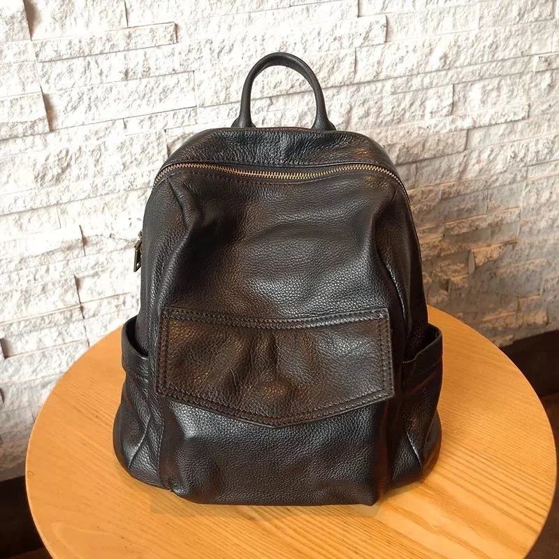 

Women's backpack soft leather casual Japanese and Korean fashion solid color first layer cowhide zipper ladies