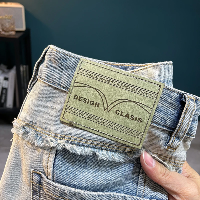 TC2932 Pantaloncini di jeans americani da strada con fori rotti pantaloni da cinque minuti con toppa ricamata sottile elastica marea da uomo