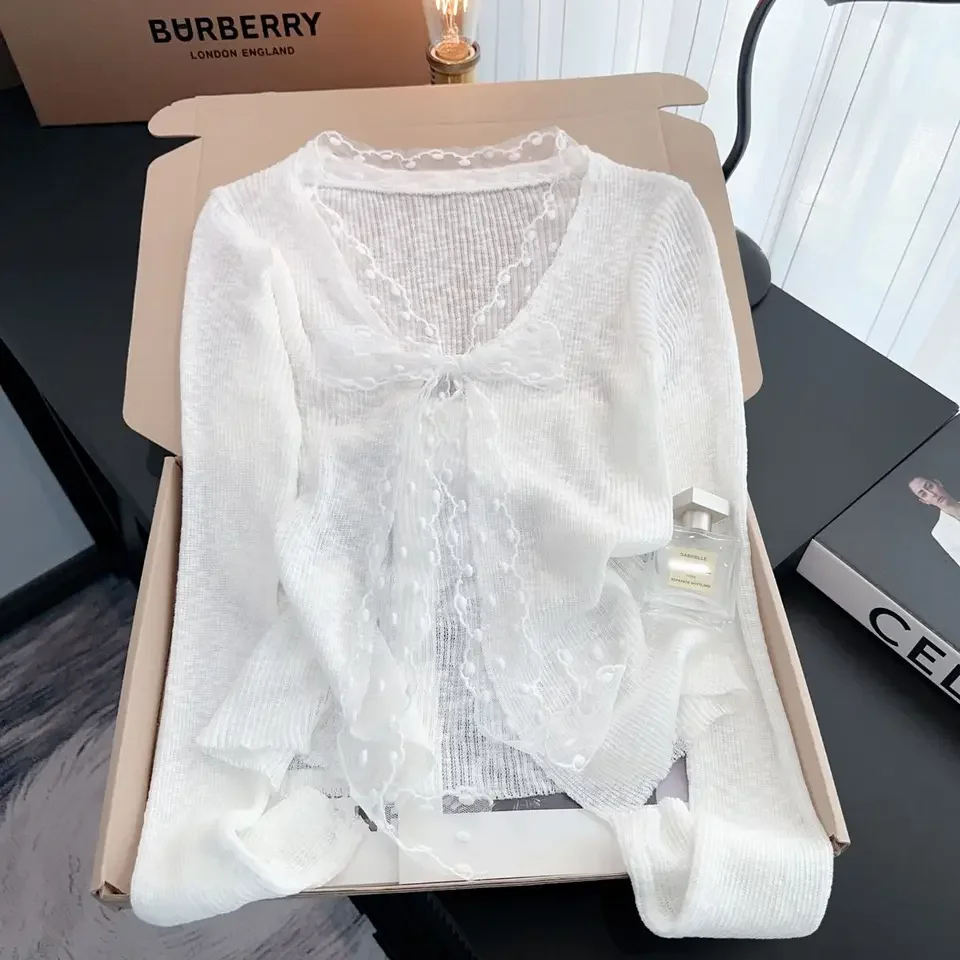 Cárdigan de punto con protección solar de encaje y lazo para mujer, novedad de verano, Top holgado con cuello en V, versión coreana, abrigo versátil de manga larga de Color sólido