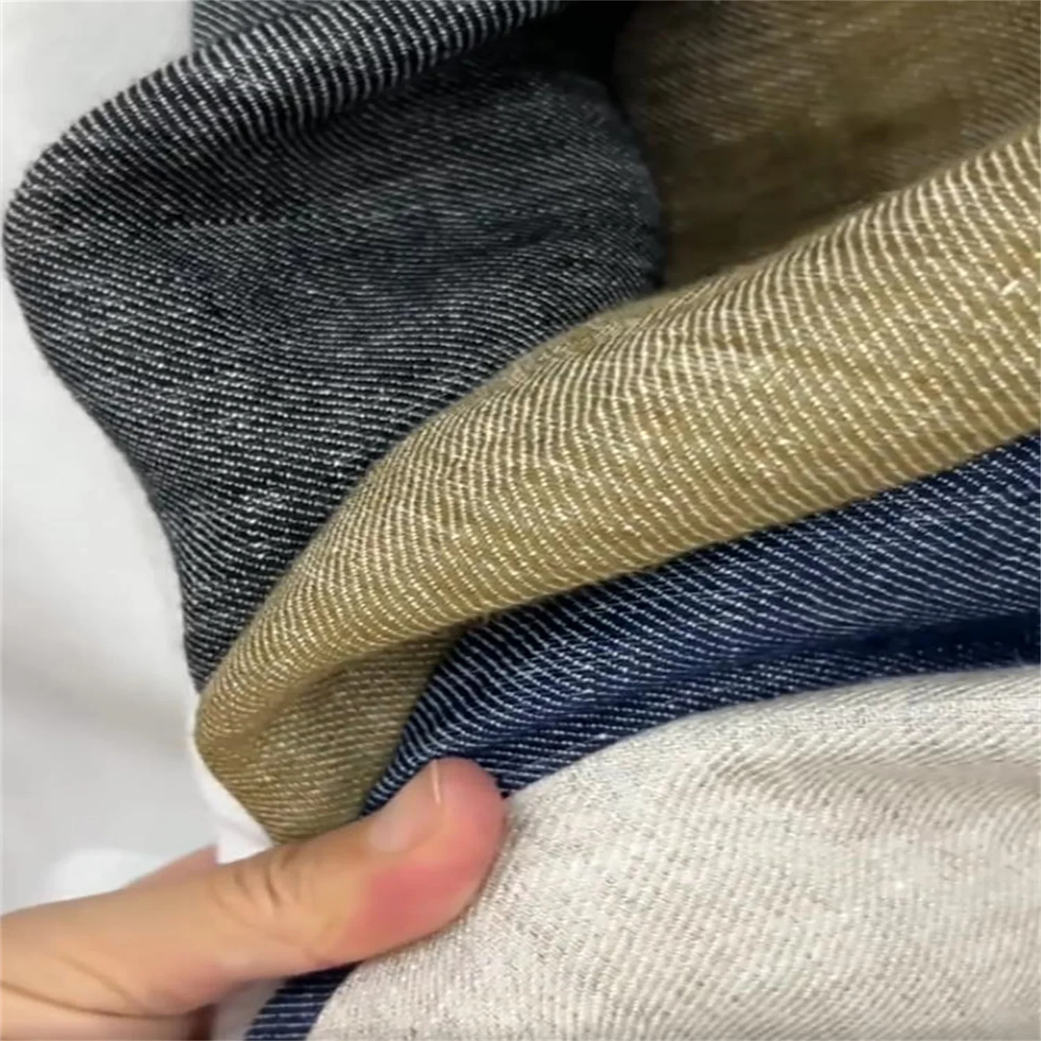 Summer yarn dyed fermented denim fabric, high-end pants and skirts fabric, and wide pure linen fabric.