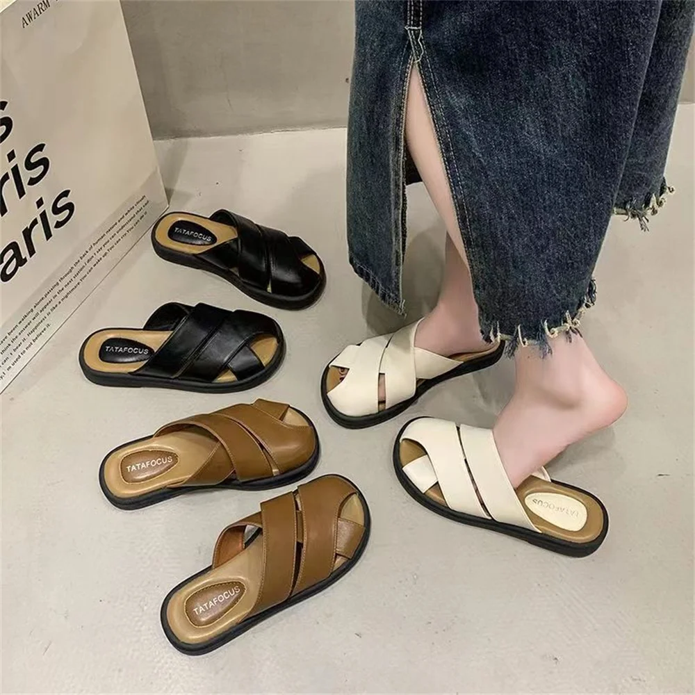 Baotou semi-slipper women wear pregnant women in summer, lazy people pedal office, Roman woven hollow muller shoes sandals.