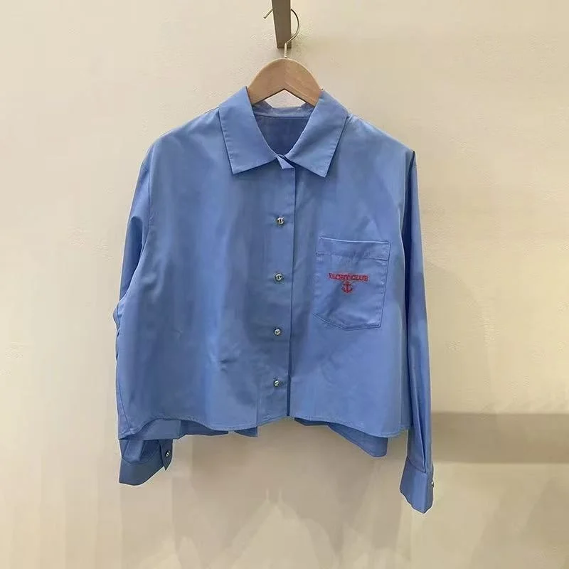 

Женская однотонная рубашка с воротником поло, на одной пуговице, с английской вышивкой, повседневная, ранняя весна 2026