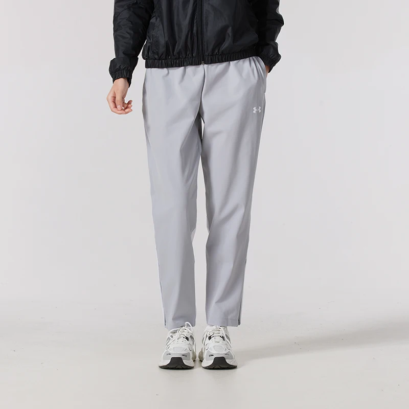 

Женские спортивные брюки Underarmour для бега на открытом воздухе, удобные, дышащие, быстросохнущие, тканые длинные брюки для фитнеса и тренировок 1389660-011