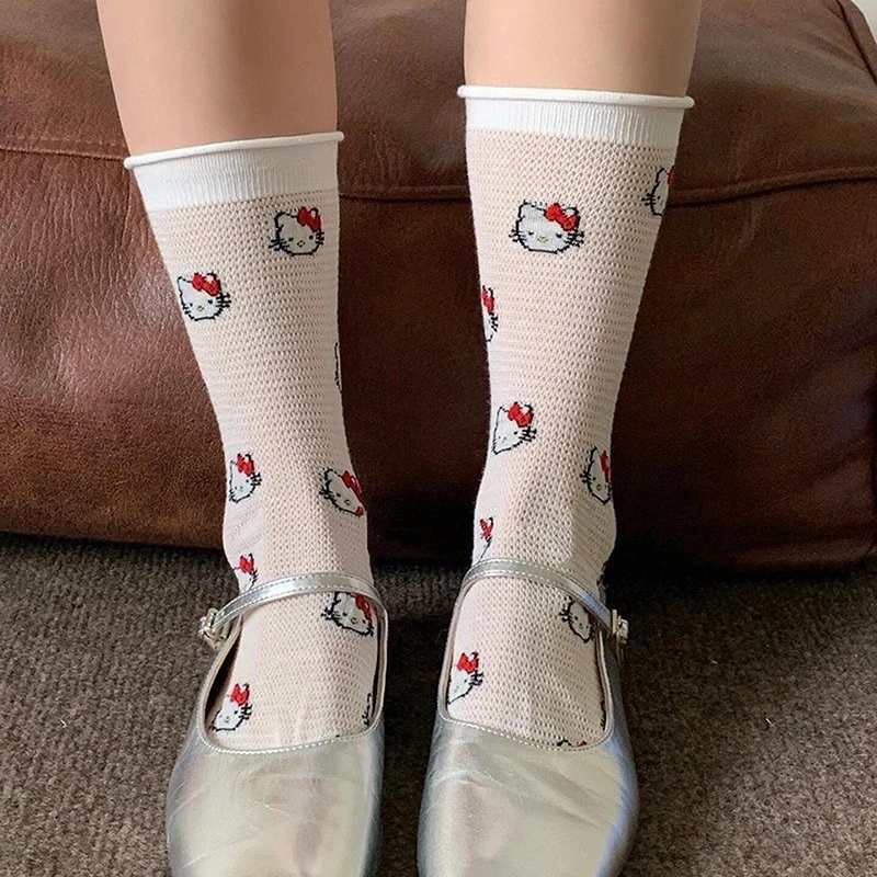 Calcetines de dibujos animados Sanrio, medias de tubo medio con lazo de Hello Kitty, malla deportiva fina de algodón, medias transpirables huecas, dulces regalos de corazón femenino