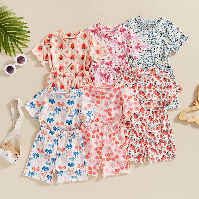 

2024-04-18 Lioraitiin Toddler Baby Girl Summer Outfits Short Sleeve Floral/Bow/Fruit Print Tops + Shorts Set 2Pcs Clothes