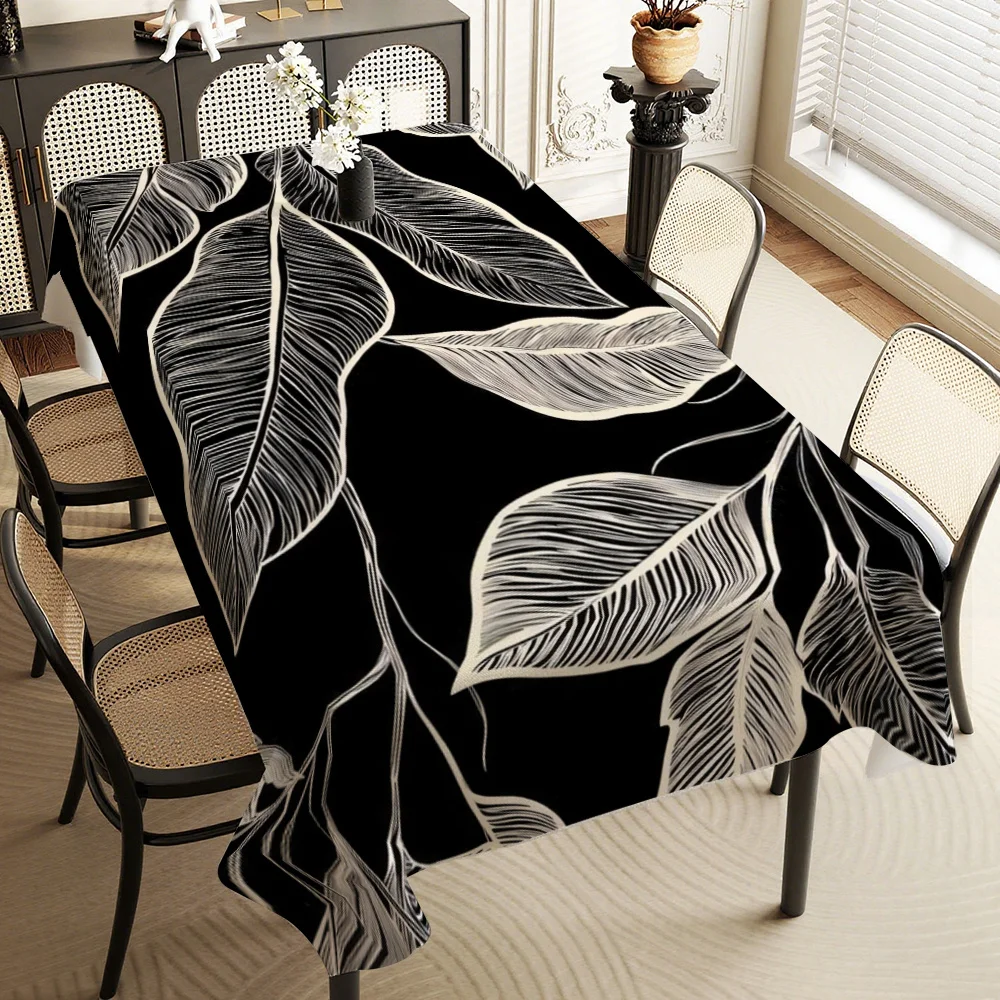 Durable polyester tablecloth with a black and white vein pattern design, suitable for modern home decoration.