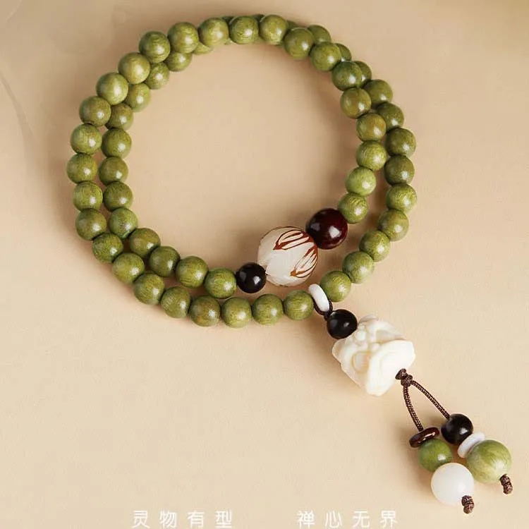

Women's Green Sandalwood Beaded Bracelets Traditional Lion Carved Wooden Prayer Beads Sandalwood Scented Wrist Jewelry Gifts