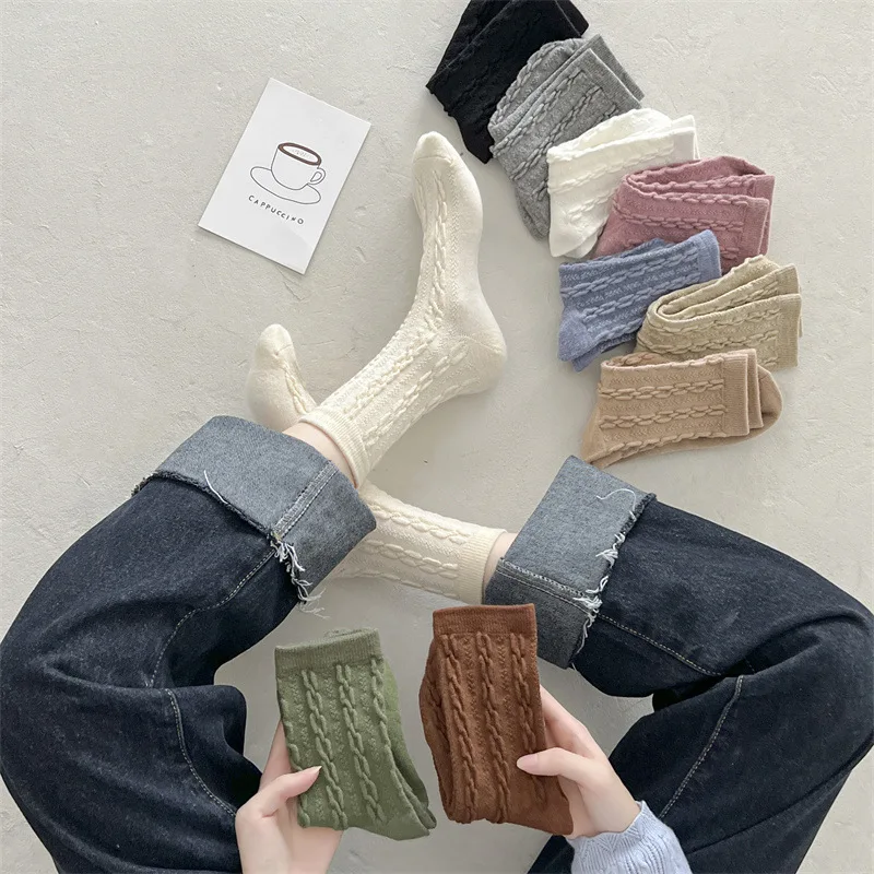 

Autumn and winter women's Korean version of Japanese school style solid color twist pile socks middle tube warm wool socks