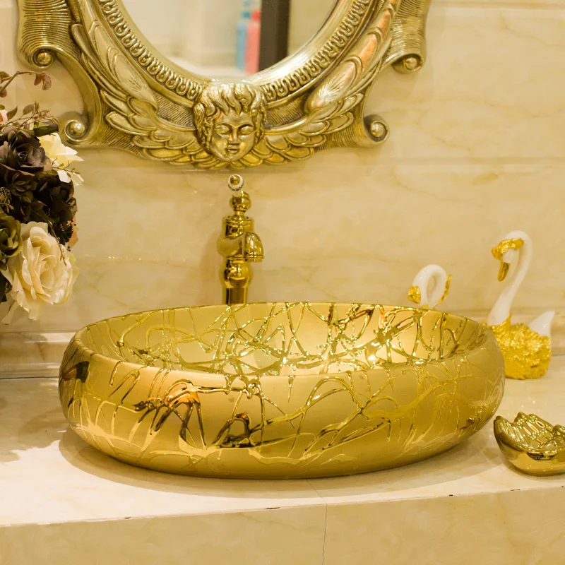 

China Handmade Europe Vintage Style Oval Lavobo Ceramic wash basin Countertop oval gold carving ceramic wash basin