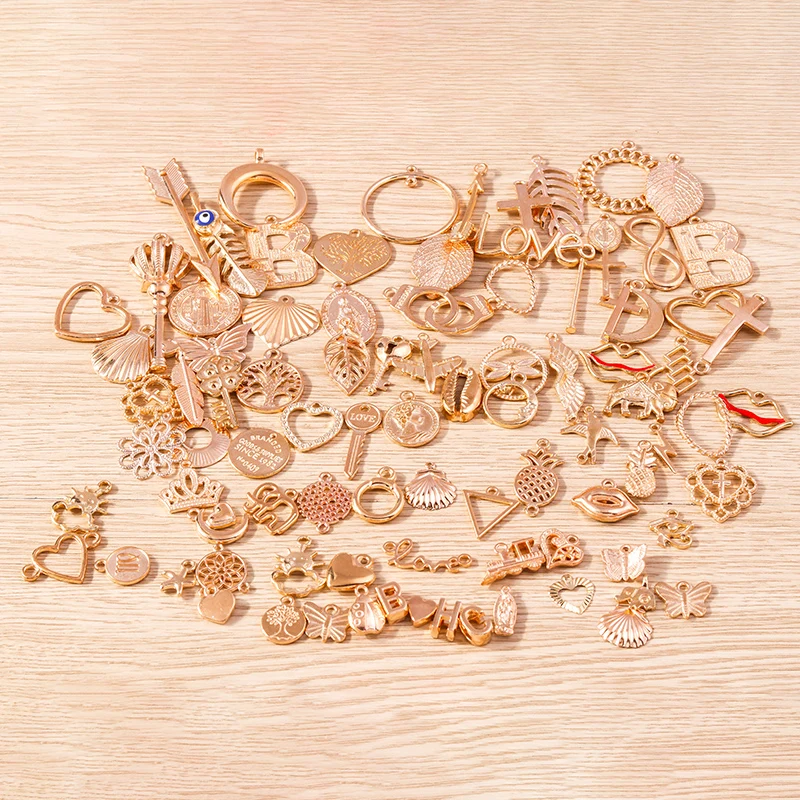 Tusember 10/20/30/50 Stück Legierungs-Anhänger in Tier-, Stern-, Blumen- und Kreuzform für Armbänder, Halsketten, DIY-Schmuckherstellung, goldfarbene Charms – Detail 1