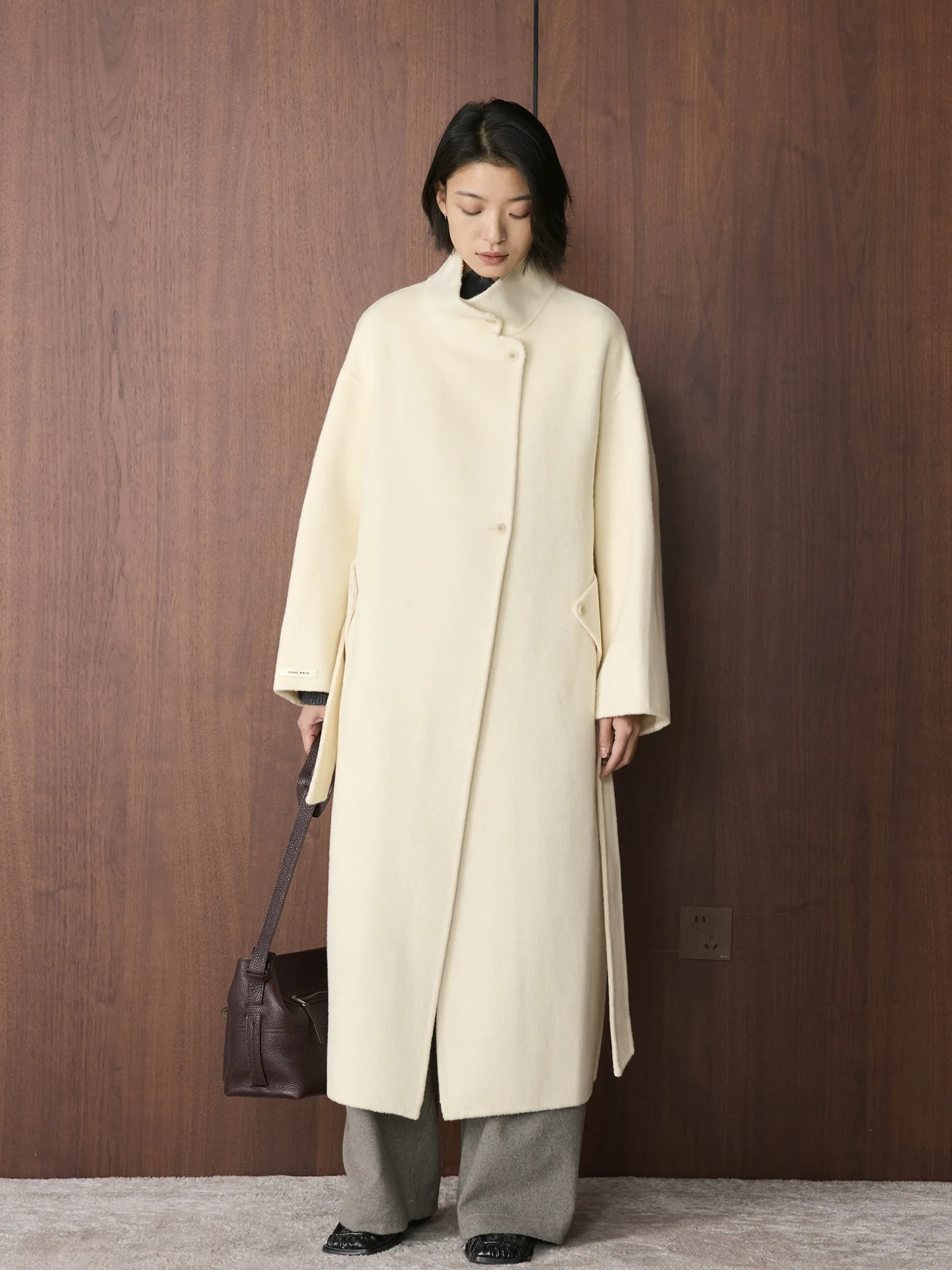 冬の新作韓国版シンプルでおしゃれなスタンドカラーのダブルウールコート、ウエストベルト付き、女性用暖かいジャケット