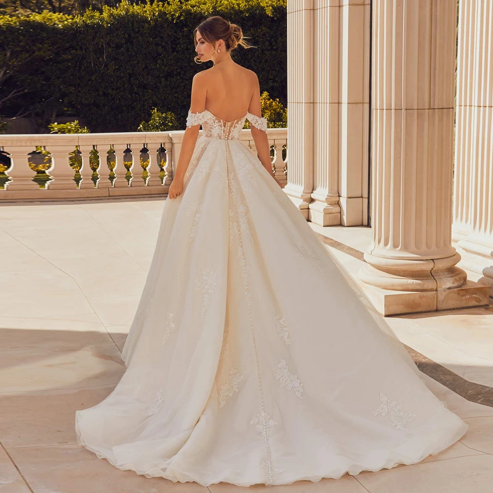 Personalizado elegante sem alças vestidos de casamento sem mangas frente fenda nupcial crescido apliques tule a linha vestido de novia 2025