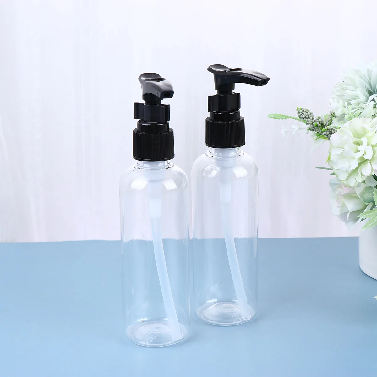 

4pcs 100Ml Pump Dispenser Bottles Durable Plastic Lotion Shampoo Body Wash Storage Containers For Travel Camping