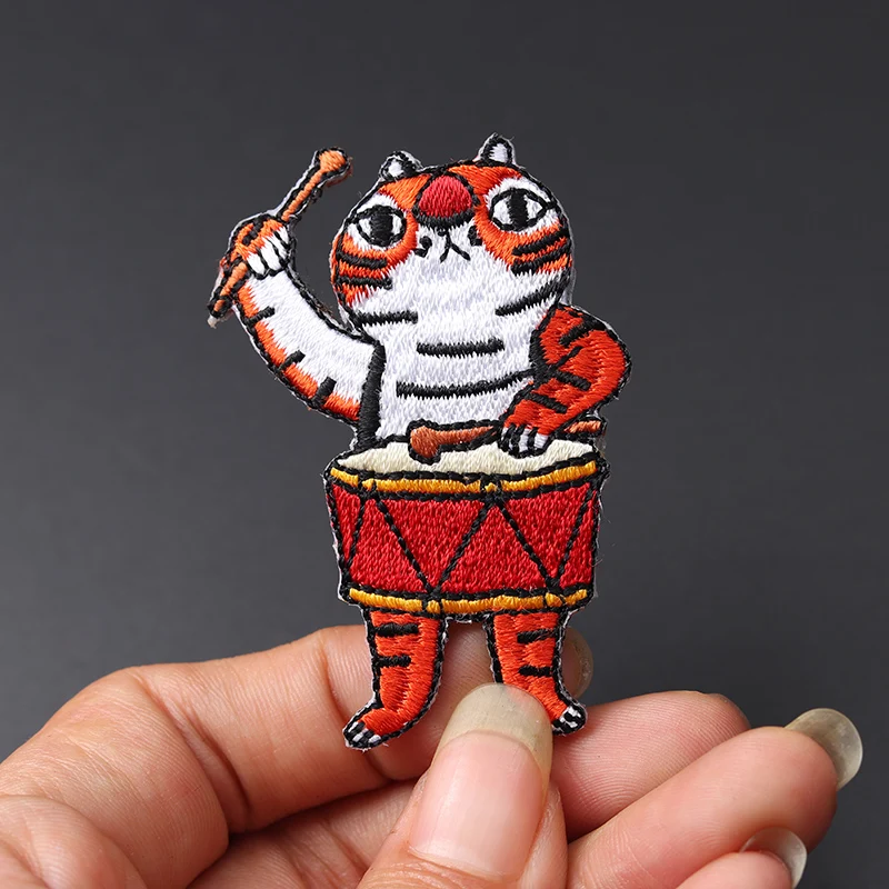 Cartoon Drumming Tiger Size: 5.8x4.2cm Iron On Patch for Clothing Embroidered Sewing Applique Woven Badge Sew-On Patches