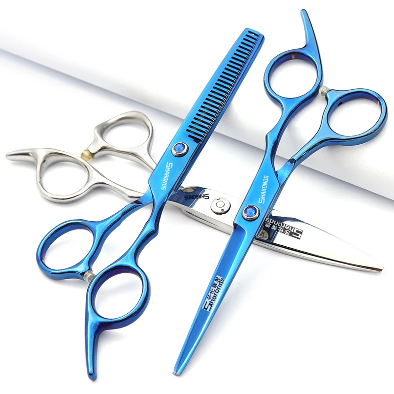 6-inch professional hair clippers, flat teeth clippers, thinning tools, bangs thinning scissors, and broken hair scissors.