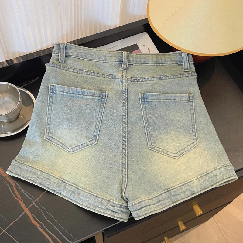 Bomon Spice Girls design sense of irregular fake two skirt high waist a stretch wrap hip slimming denim shorts women summer