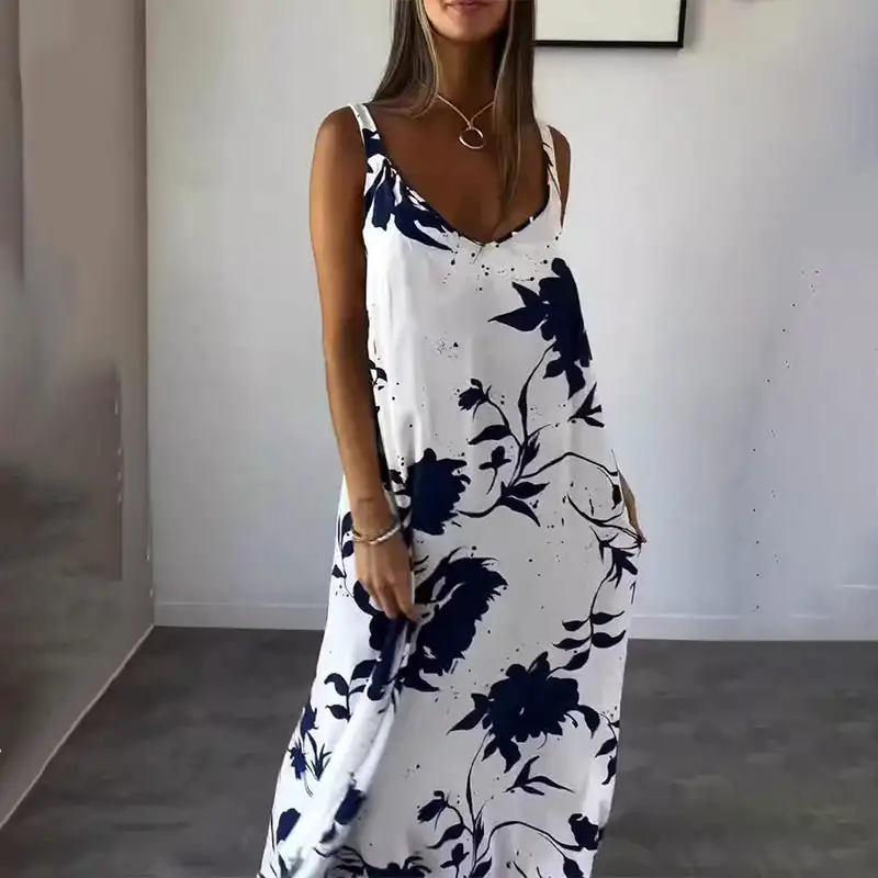 Fluid dress with thin straps, sleeveless and uncovered on the Women's Floral Spaghetti Strap Sleeveless Backless Flowing Dress