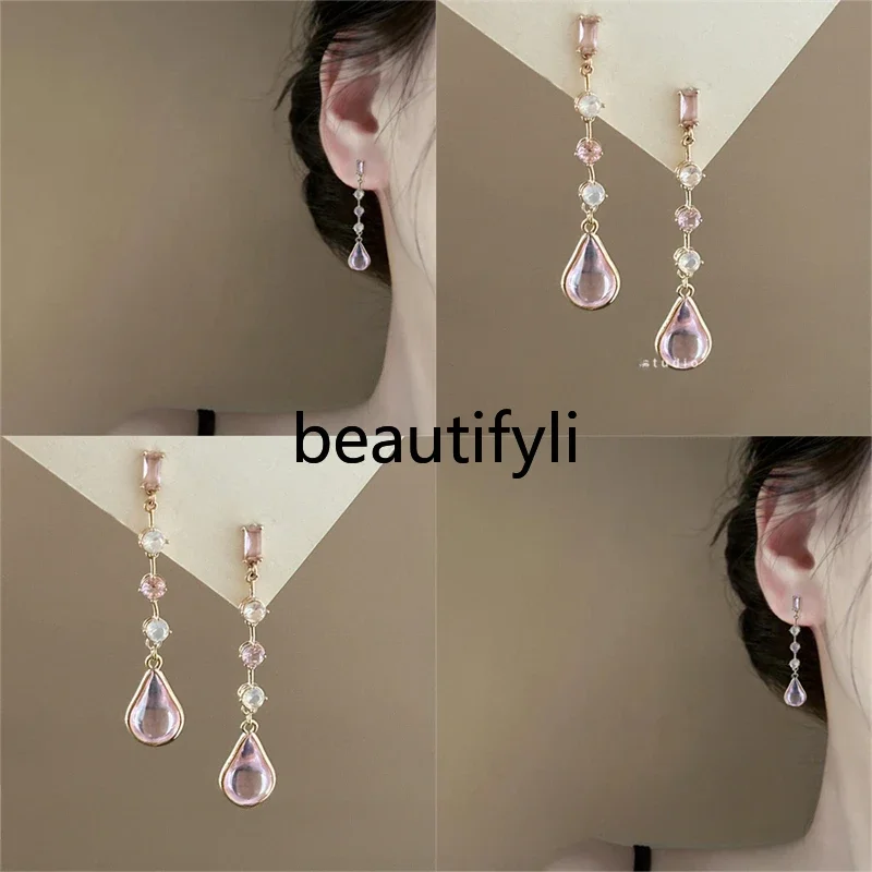 

Pink water droplets! Pale pink crystal peach blossom earrings! Long water drop zircon stud earrings, earclips.