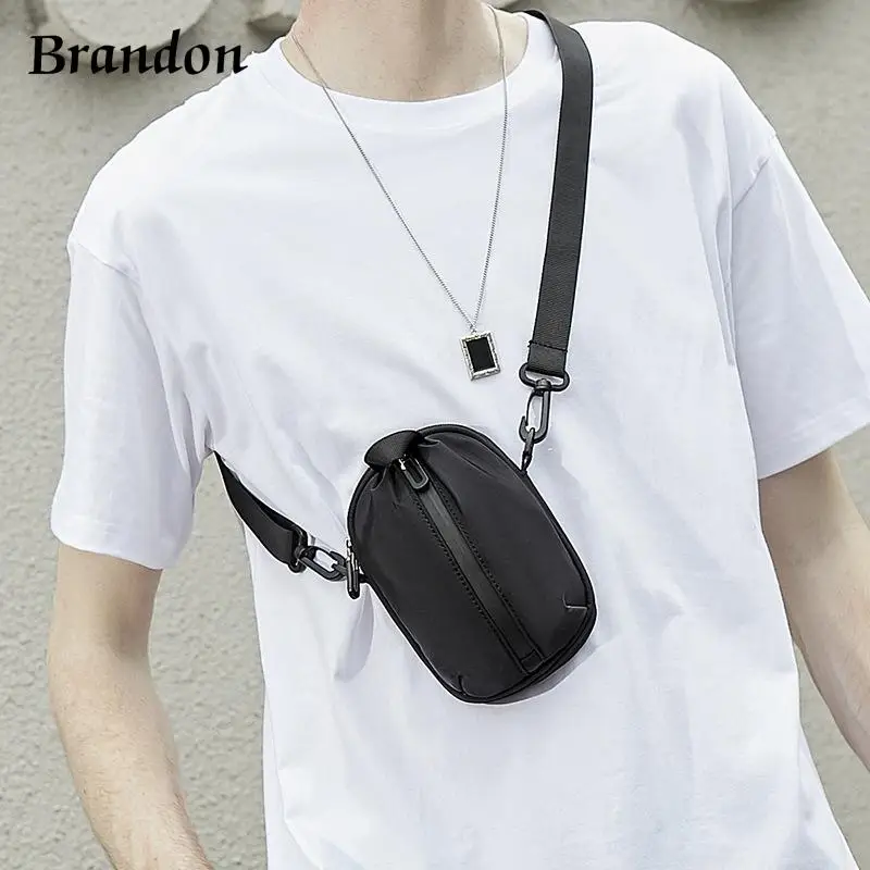 

Designer men's high-end casual versatile crossbody bag ins mini niche single shoulder change hanging bag hip-hop phone bag