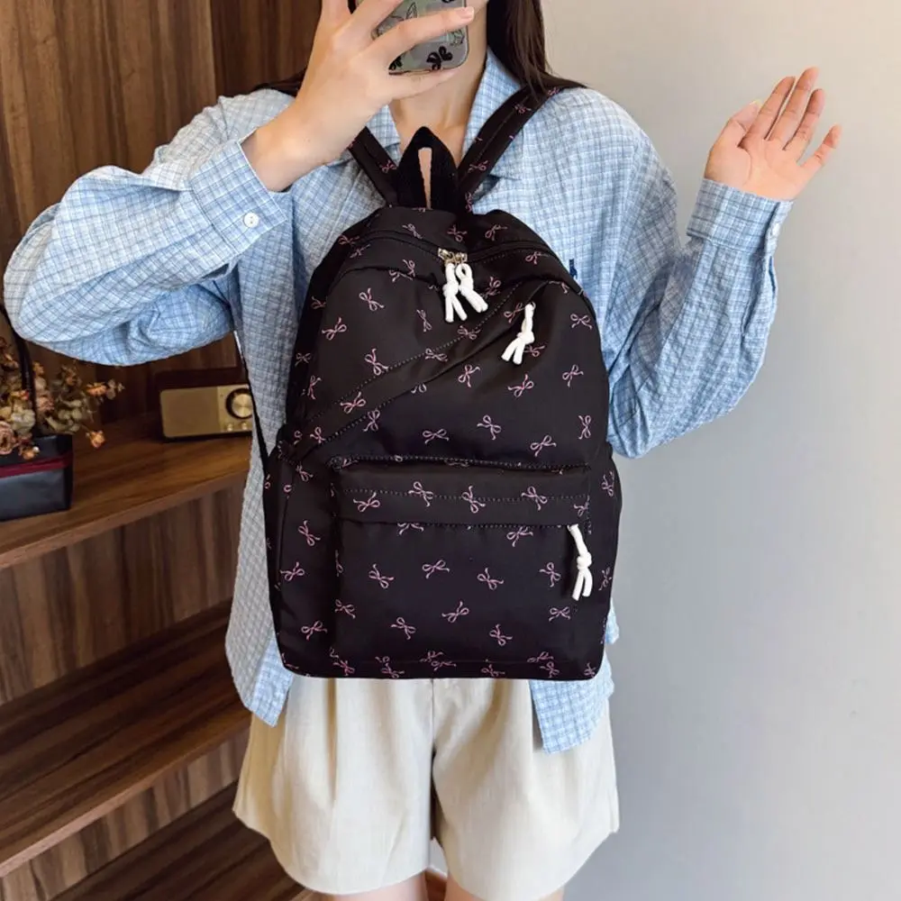 حقيبة مدرسية محمولة للطلاب مطبوعة على شكل فيونكة من النايلون بسعة كبيرة