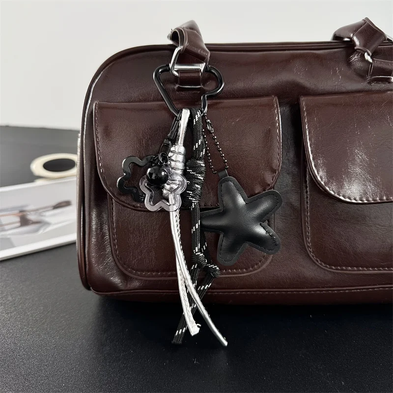 Grunge Star Bag Charm Distressed Metal Knot Aesthetic Layered Edgy Accessory for Y2K Streetwear Backpacks Alternative Fashion