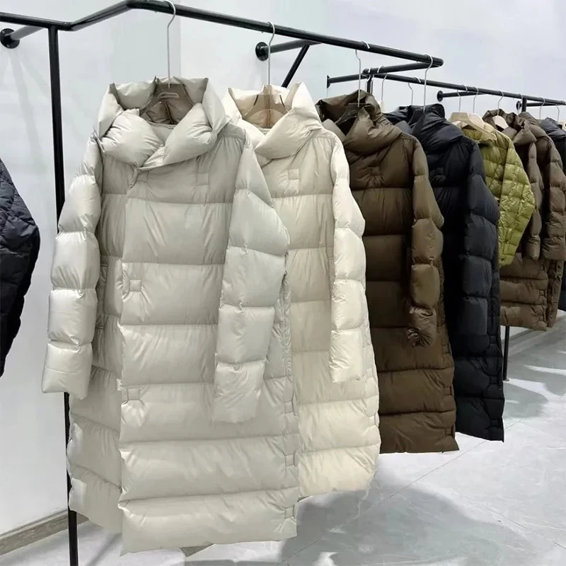 เสื้อแจ็คเก็ตขนเป็ดขาว 90% คุณภาพสูง หนานุ่ม สำหรับผู้หญิง ฤดูหนาว 2025 ทันสมัยและฟูอย่างดี