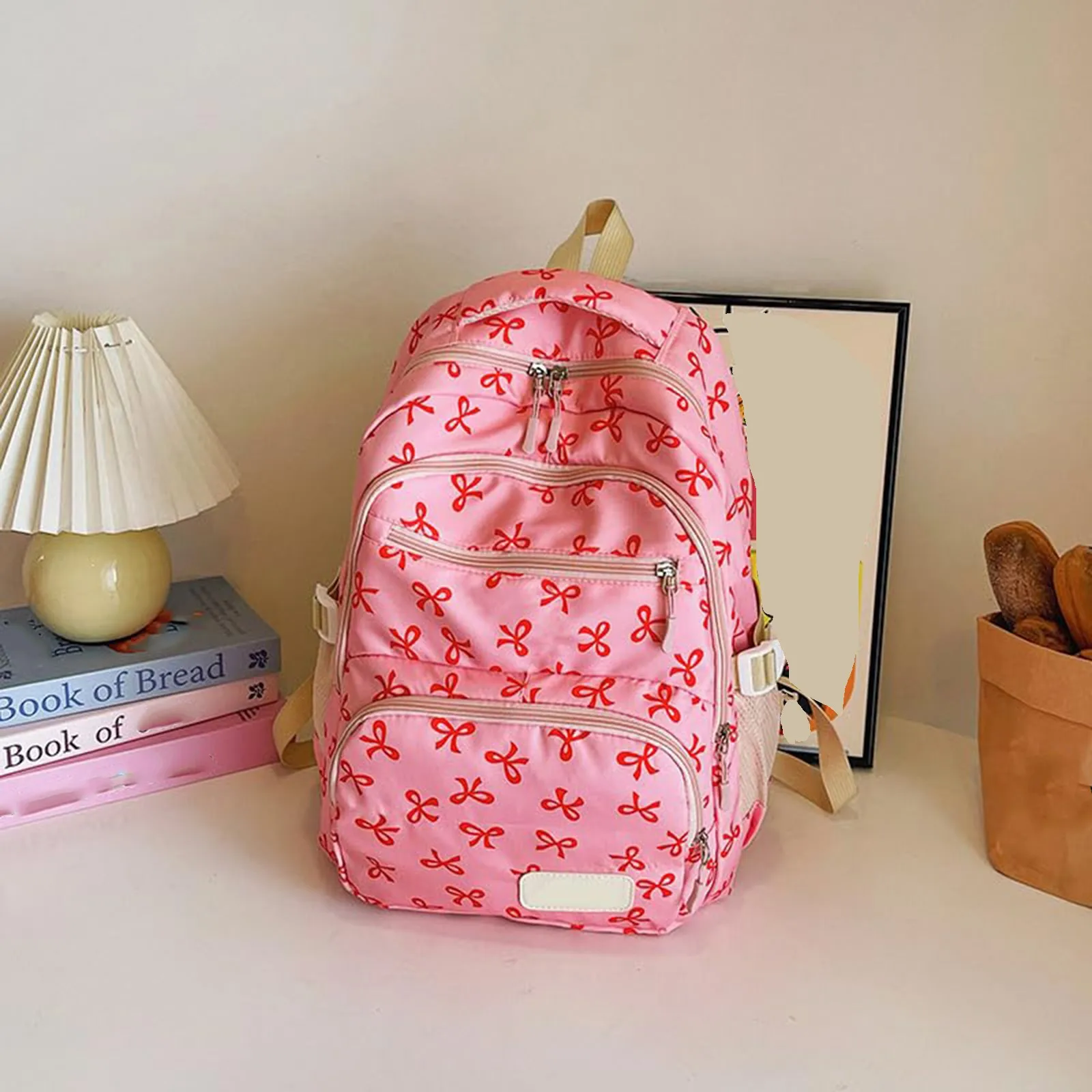 حقيبة ظهر نسائية كورية عصرية مطبوعة بفيونكة خفيفة الوزن وبسيطة حقيبة مدرسية للطلاب قابلة للتعديل طقم حقيبة نسائية مكون من ثلاث قطع