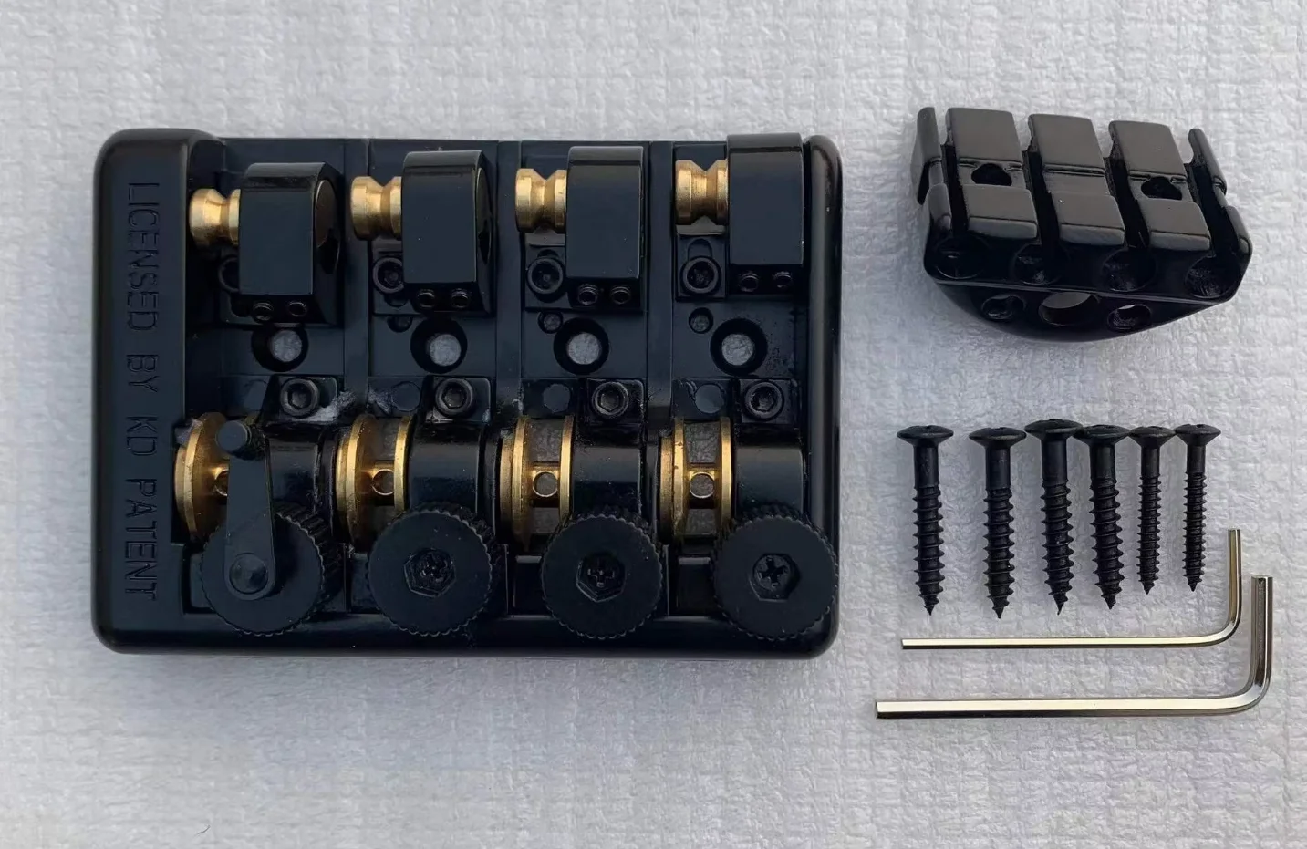

Professional Travel Bass Bridge WB1004 ALP 4 String Headless Brass Roller Saddle Black Color Guitar Accessories in Stock