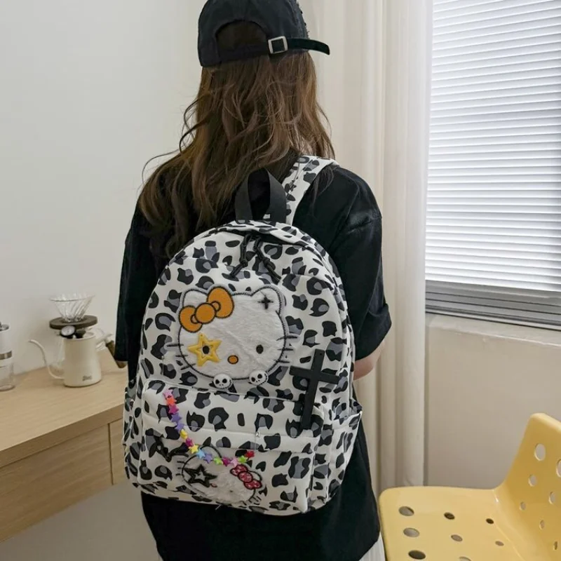 Sanrio tas ransel sekolah murid, tas punggung bantalan bahu kasual ringan dan kapasitas besar, kartun lucu, tas sekolah murid Hello Kitty