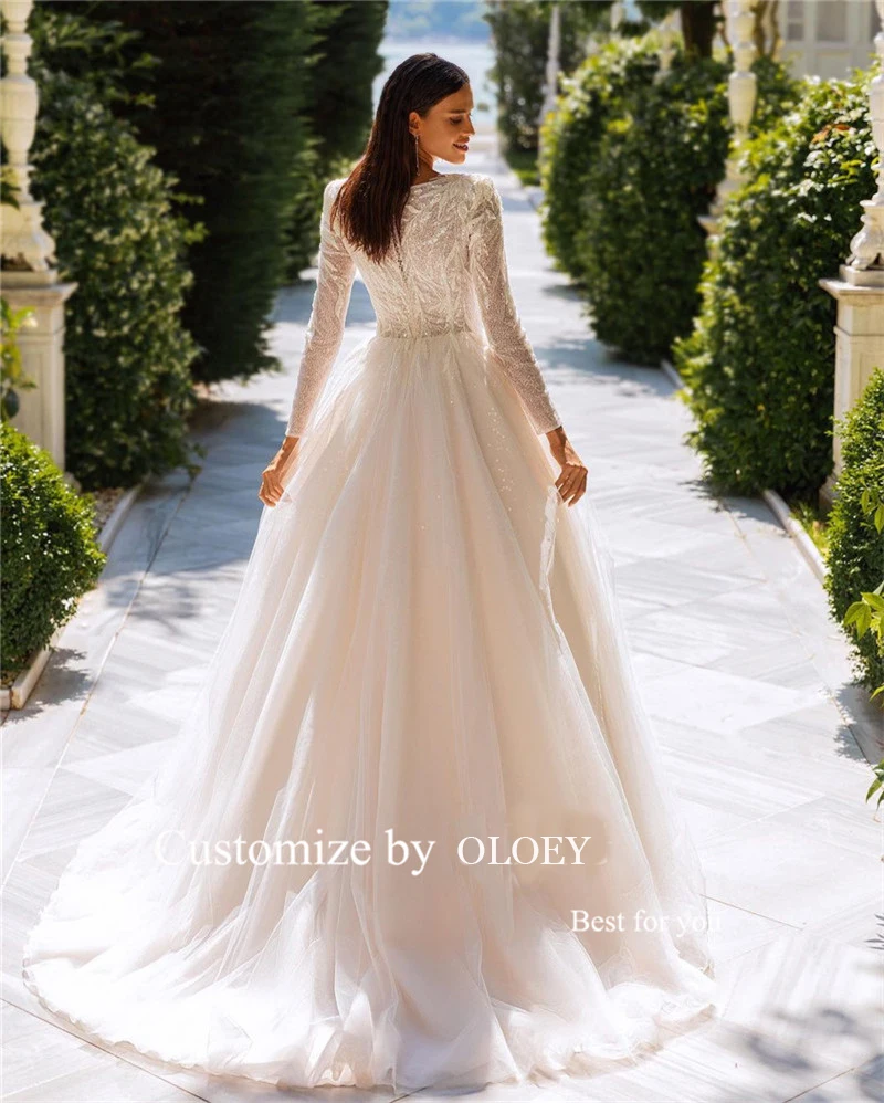 OLOEY Modest Glitter A Line abiti da sposa maniche lunghe collo trasparente Tulle lunghezza del pavimento abiti da sposa scintillanti Vestido de novia