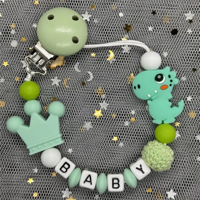 Penjualan terlaris kustom nama dot buatan tangan klip pemegang silikon dinosaurus dot rantai bayi Teether rantai hadiah