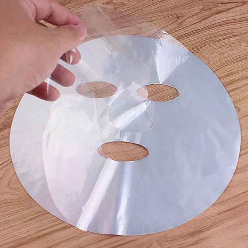 100Pcs Natürliche Volle Gesicht Reiniger Maske Papier Einweg Kunststoff Film Schönheit Gesunde Werkzeug Hautpflege Einweg Papier Masken