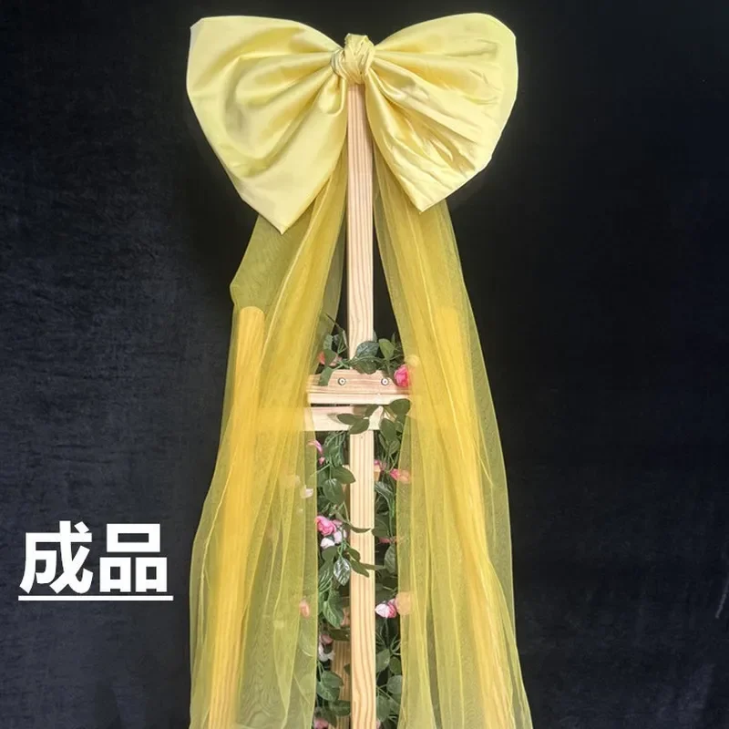 Large Yellow Bow Jewelry Display Stand Home Living Room Decor Christmas Tree Ornament Festive Atmosphere Scene Layout